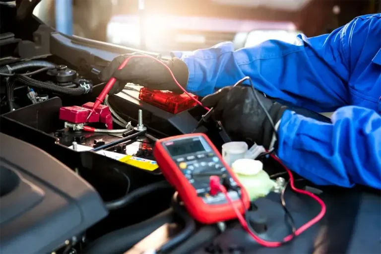 Mechanic Checking Battery Health