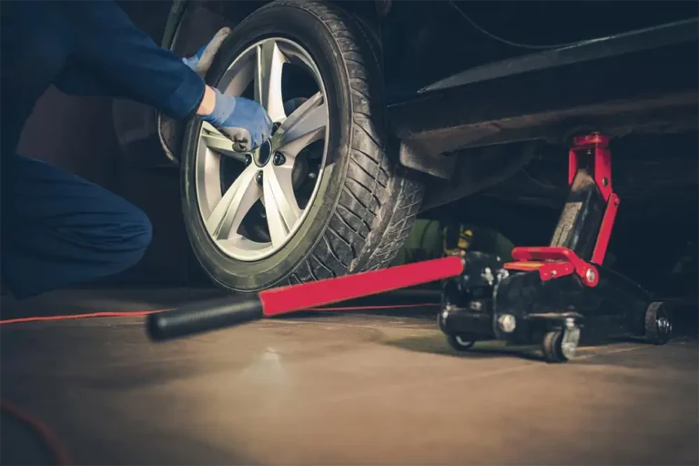 Mechanic Mounting Tire After Repair It